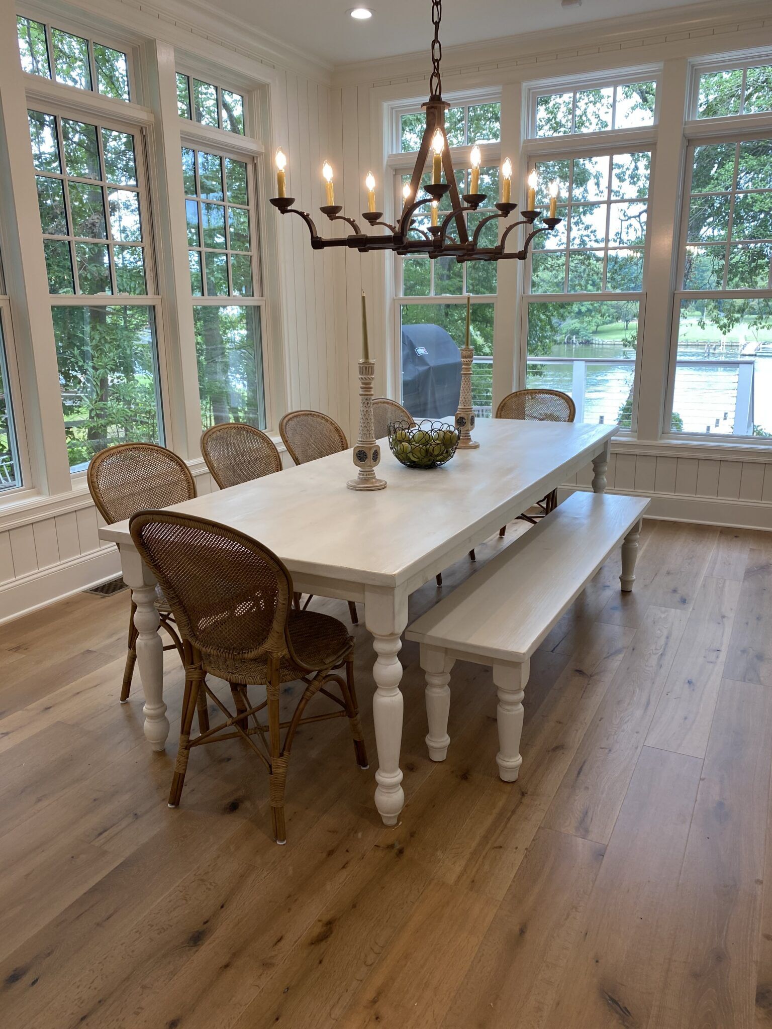Solid wood dining table with a bench and individual chairs